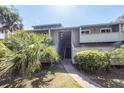 Condo building exterior shows a welcoming entrance with lush greenery enhancing the property's curb appeal at 1158 Village Creek Ln # 3, Mount Pleasant, SC 29464