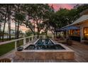Inviting outdoor pool and deck area, perfect for relaxation and entertaining with a sunset view at 1456 Mcpherson Lndg, Johns Island, SC 29455