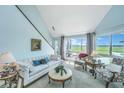 Inviting living room with marsh views, comfortable seating, and stylish decor at 242 Little Oak Dr, Folly Beach, SC 29439