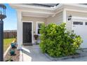 Close-up of the front door and landscaping, highlighting the home's curb appeal at 546 Alderly Dr, Moncks Corner, SC 29461