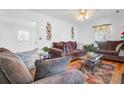 Comfortable living room featuring hardwood floors, stylish decor, and ample seating at 679 Kent St, Mount Pleasant, SC 29464