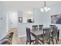 Charming dining room with modern table and chairs at 1600 Long Grove Dr # 626, Mount Pleasant, SC 29464