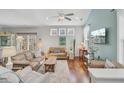 Inviting living room with hardwood floors, neutral paint, lots of light, and comfortable seating at 1807 Chauncy'S Ct, Mount Pleasant, SC 29466