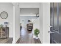 Welcoming entryway with hardwood floors, neutral paint, and stylish decor at 203 Hayworth Rd, Summerville, SC 29486