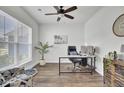 Bright and airy home office with a ceiling fan, a large window and an organized work space at 203 Hayworth Rd, Summerville, SC 29486