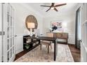 Inviting home office with a modern desk, decorative rug, and a large window that provides natural light for working comfortably at 2800 Lacy St, North Charleston, SC 29406