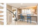 Bright dining area featuring a spiral staircase and window bar with comfortable seating at 302 Palmetto Dr # A-302, Isle of Palms, SC 29451