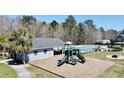 Community playground and pool, providing outdoor fun and relaxation at 629 English Oak Cir, Moncks Corner, SC 29461