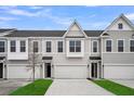 New construction featuring an attached garage and a covered front porch entrance at 108 Brown Swiss Cir, Summerville, SC 29483
