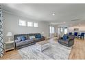 Bright, spacious living room with hardwood floors, contemporary decor, and ample natural light at 131 Brant Dr, Summerville, SC 29483