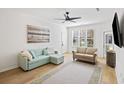 Comfortable living room with a view to the front door and outdoor access at 200 Bucksley Ln # 105, Charleston, SC 29492