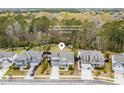 Aerial view of a home backing up to protected wooded wetlands, ensuring incredible privacy at 2335 Brinkley Rd, Johns Island, SC 29455