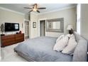 Neutral main bedroom with a plush bed, modern decor, and carpet at 263 Stefan Dr, Charleston, SC 29412