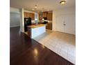 This spacious kitchen features stainless steel appliances, granite countertops, and an island with a sink at 3059 Adventure Way, Ladson, SC 29456