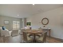 Open-concept living area with hardwood floors and lots of space to entertain at 312 Pine Crest View Dr, Summerville, SC 29486