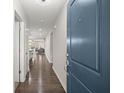 Bright foyer with wood flooring leads into the open-concept living space at 420 Thoroughbred Dr, Moncks Corner, SC 29461