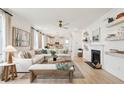 Cozy living room features lots of natural light and an inviting fireplace at 421 Grove End Rd, Moncks Corner, SC 29461