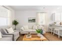 Cozy living area with bright windows, comfortable seating, and natural light at 6226 Gritman Dr, Hollywood, SC 29470