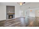 Bright living room with a modern fireplace, high ceiling, and beautiful floors at 1146 Rivercrest Dr, Charleston, SC 29412
