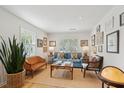 Bright living room featuring neutral walls, a large window, and stylish furniture at 223 Grove St, Charleston, SC 29403