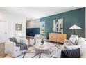 Bright living room with accent wall, modern furniture, and stylish decor at 455 Minim St, Charleston, SC 29414