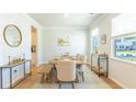Bright dining room with a wooden table and stylish decor at 509 Yukon Ct, Lincolnville, SC 29485