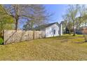 Fenced backyard offering privacy and space to enjoy outdoor living at 9861 Levenshall Dr, Ladson, SC 29456