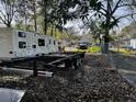 A trailer with wheels sits in the yard at 1255 Remount Rd, North Charleston, SC 29406