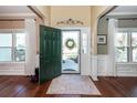 Bright foyer with hardwood floors and decorative trim at 2052 Bancroft Ln, Mount Pleasant, SC 29466