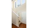 Bright entryway with hardwood floors, stairs, and large windows allowing for ample natural light at 2920 Woodland Park Dr, Mount Pleasant, SC 29466