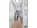 Hallway features grey walls, white trim, and access to bathroom and bedrooms at 503 Amberjack Way, Summerville, SC 29485