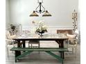 Unique dining room featuring vintage furniture, decorative lighting, and artistic accents at 572 Tidewater Chase Ln, Summerville, SC 29486