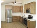 Modern kitchen featuring stainless steel appliances, bright countertops, and ample cabinetry at 8311 Whitehaven Dr, North Charleston, SC 29420