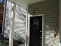 Condo unit door 1204 with dark door and hardware at 1204 Grove Park Dr, Charleston, SC 29414