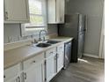 Functional kitchen featuring stainless steel appliances and classic white cabinetry at 139 Stephanie Cir, Summerville, SC 29483