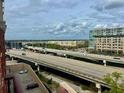 Urban living with a view of city buildings and roads on a partly cloudy day at 150 Bee St # 713, Charleston, SC 29401