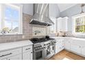 Gourmet kitchen featuring stainless steel appliances, granite countertops, and custom cabinetry at 2912 Yachtsman Dr, Mount Pleasant, SC 29466