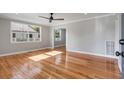 Bright living room featuring hardwood floors and ample natural light at 4625 Durant Ave, North Charleston, SC 29405