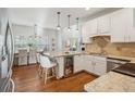 Kitchen with island and bar stool seating at 5556 Indigo Fields Blvd, North Charleston, SC 29418