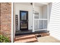 Inviting entryway with brick steps leading to a cozy porch and decorative door at 104 Abrum Ct, Goose Creek, SC 29445