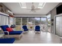 Cozy sunroom with bright skylights, comfortable seating, and scenic outdoor views at 1232 Palmetto Peninsula Dr, Mount Pleasant, SC 29464