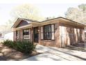 Inviting brick home with a well-kept lawn and a quaint, comfortable feel at 208 Owens Dr, Summerville, SC 29485