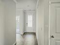 Entry hallway features wood floors and white trim throughout at 482 Oak View Way, Summerville, SC 29483