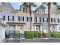 Attractive townhomes with lush landscaping, private entrances, and parking, creating a welcoming residential atmosphere at 4913 Lake Palmetto Ln, North Charleston, SC 29418