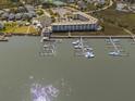 Aerial view of the waterfront condo and marina, highlighting the coastal location at 116 Bay Creek Villa, Edisto Beach, SC 29438