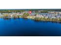 Community aerial view featuring homes, a lake, and neighborhood amenities at 122 Yorkshire Dr, Moncks Corner, SC 29461