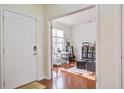 Bright foyer leading to an office space with hardwood floors and natural light at 125 Old Jackson Rd, Goose Creek, SC 29445