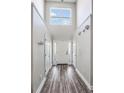 Welcoming foyer features hardwood floors, natural light and multiple entrances at 8842 Gable St, North Charleston, SC 29406