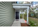 A close-up view of the house number above the black front door at 103 Rosa Gray Ln, Goose Creek, SC 29445