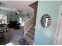 Inviting entryway with stairs and open access to the living room space at 111 Spanish Oak Ln, Ladson, SC 29456